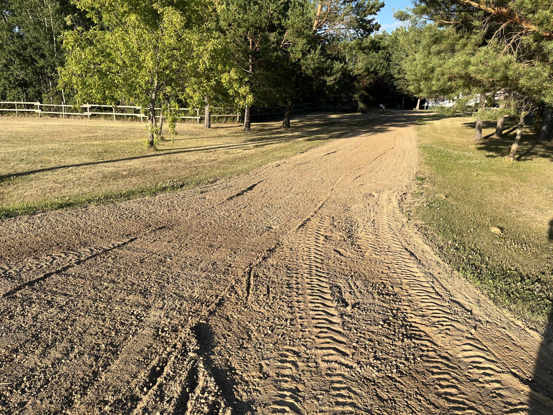 Spreading Hot Asphalt On A Pothole Repair Site